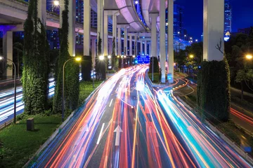 Acrylic prints Highway at night light trails under the elevated road