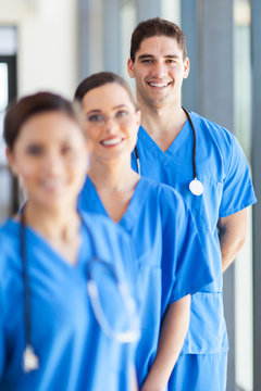 portrait of group hospital staff in office