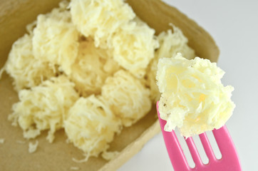 Golden threads thai dessert made form egg white cooked in syrup