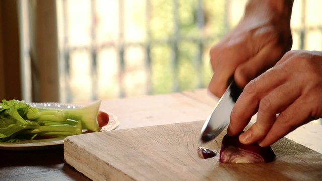 mincing red onions