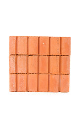 Small wall of red bricks