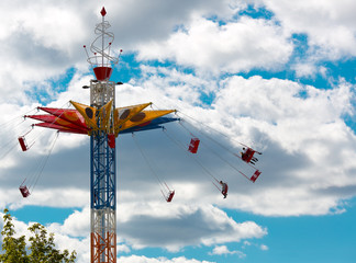 Chairoplane in sky