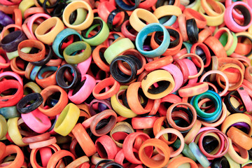 pile of colorful  tagua rings at otavalo market