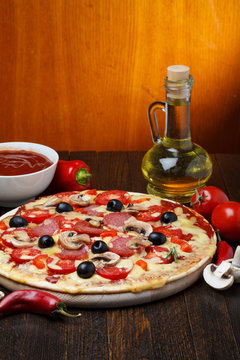 hot pizza with ingredients