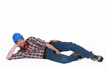 Tradesman lying on the ground