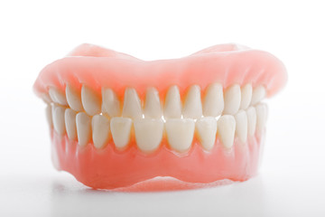 medical denture jaws smile white teeth on white background