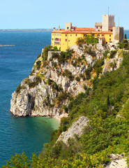 Naklejka premium Gothic Duino castle on a cliff over the Adriatic sea, Italy. 