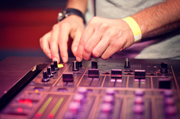 Dj mixing in night club