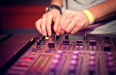 Fototapeta premium Dj mixing in night club