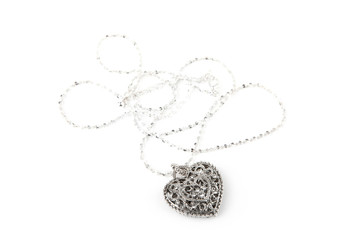 Fototapeta na wymiar Silver heart pendant necklace, Isolated on white