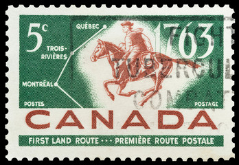 Mail stamp featuring the first Canadian postal route, circa 1963