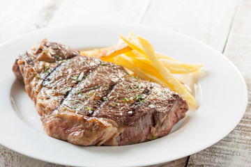 roasted beef steak with fries