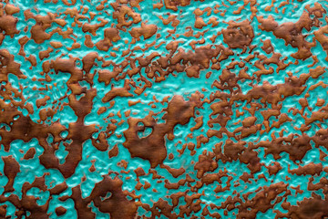 Corroded copper surface with verdigris