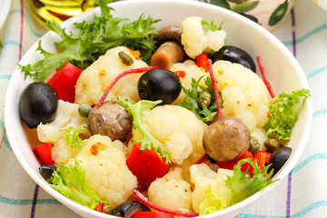 Vegetable salad with cauliflower and mushrooms