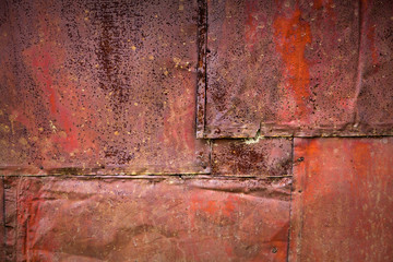 Bright red rusted metal wall detailed grunge background texture