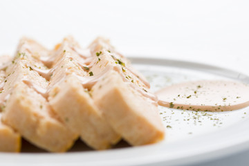 pink fish cake with mayonnaise is a tipical spanish meal