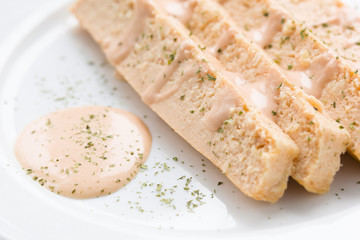 pink fish cake with mayonnaise is a tipical spanish meal