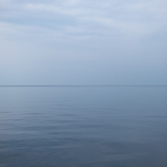 calm sea with gray sky