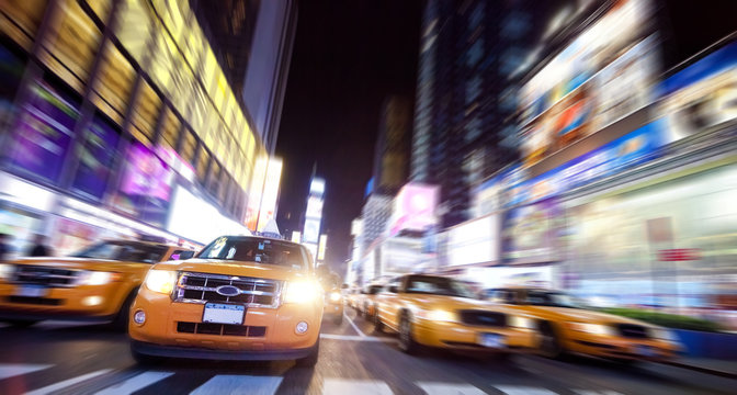 New York Taxi on Time Square in the night