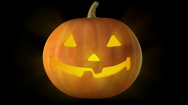 Seamlessly loopable HD video cyclical glowing jack-o-Lantern.