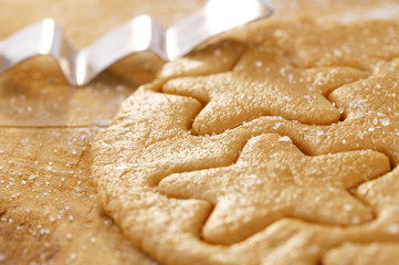 gingerbread  star cookie cuts dough