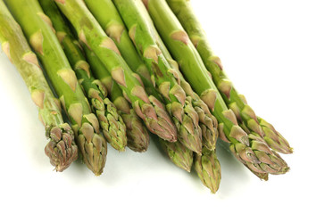 Fresh asparagus isolated on white.