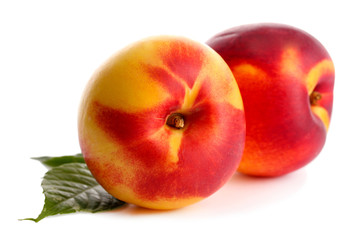 ripe nectarines, isolated on white