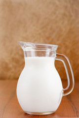 Glass jug of milk
