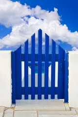 Door and cloudy sky