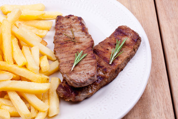 grilled steak with french fries