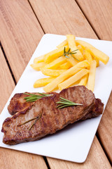 grilled steak with french fries