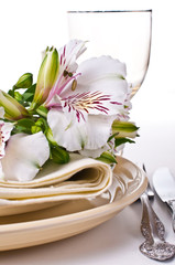 Table setting with white alstroemeria flowers