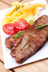 grilled steak and french fries
