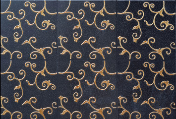 black ceramic wall with pattern