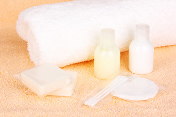 Hotel amenities kit on towel