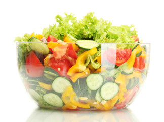 fresh vegetable salad in transparent bowl isolated on white
