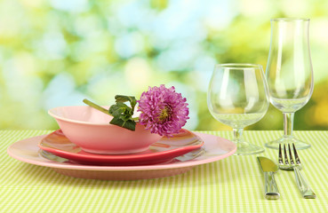 Table setting on bright background close-up