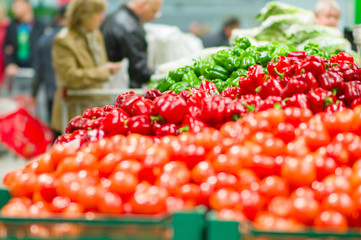 Tomatoes and red, green paprika pepper in supermarket