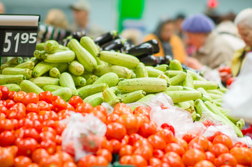 Tomatoes, zucchini and eggplants in supermarket