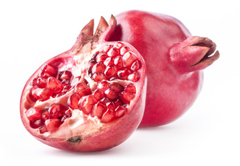 Red pomegranate fruits isolated on white background