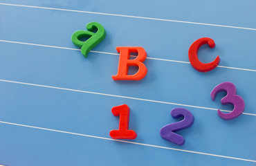 Bright letters  and numbers on blackboard