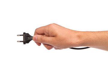 Man is holding a black outlet in the hand