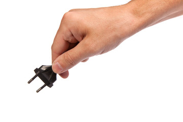 Man is holding a black outlet in the hand
