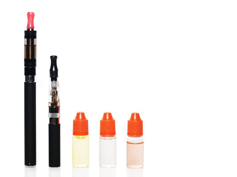 Two Electronic Cigarettes with 3 bottles of Liquid - isolated