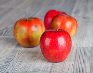 Fresh apples on wooden table