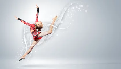 Zelfklevend Fotobehang Young woman in gymnast suit posing © Sergey Nivens