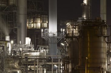 Close-up of an oil-refinery plant at night
