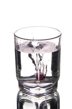 Cranberry in a glass of water