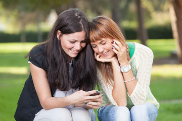 Two Young Women with Mobile Phone