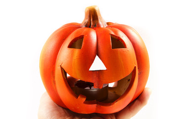 Zucca di halloween in mano